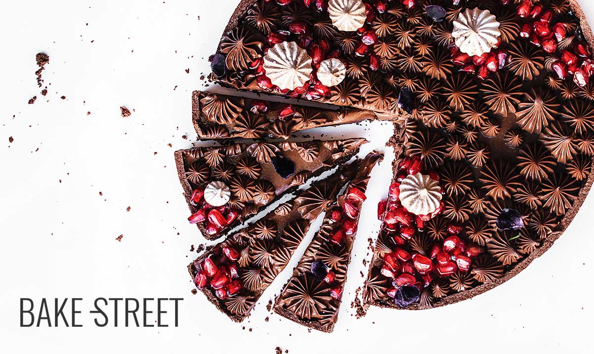 Milk chocolate and pomegranate tart