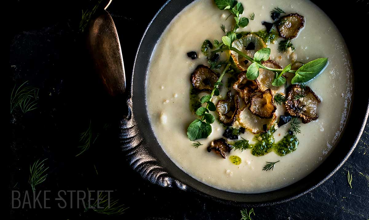 Jerusalem artichoke soup with pesto and daikon chips